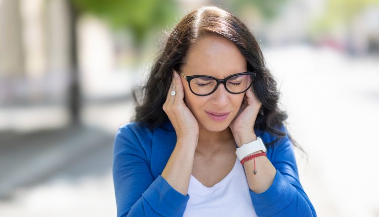 vrouw met hoofdpijn